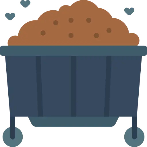 Blue dumpster filled with brown material on wheels.