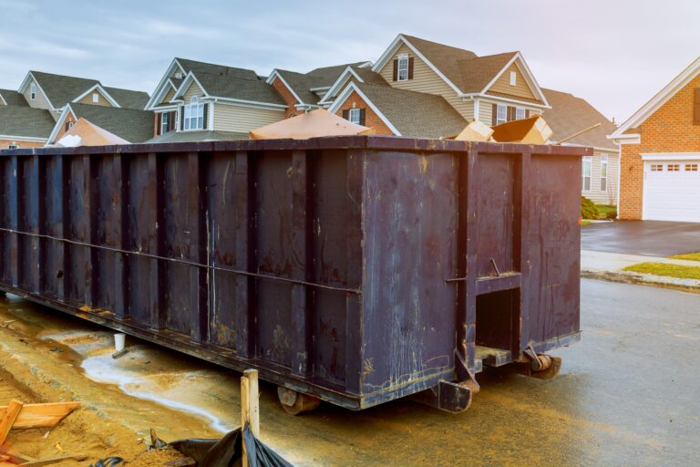 garbage containers near the new home, Red containers, recycling and waste. construction site on the background